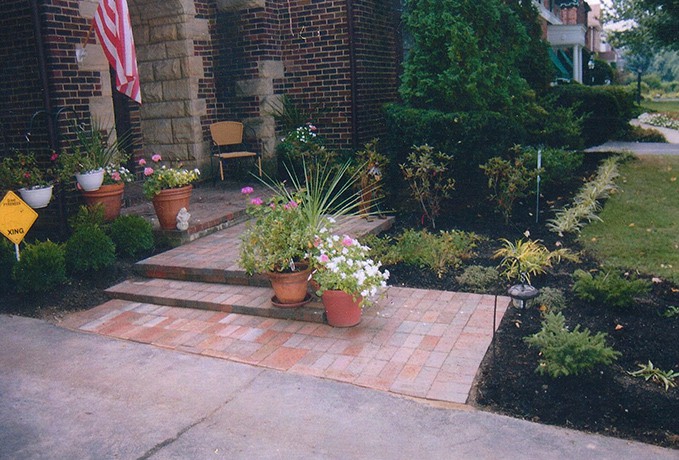 Patio and Walkways: Traditional Red Brick Patio